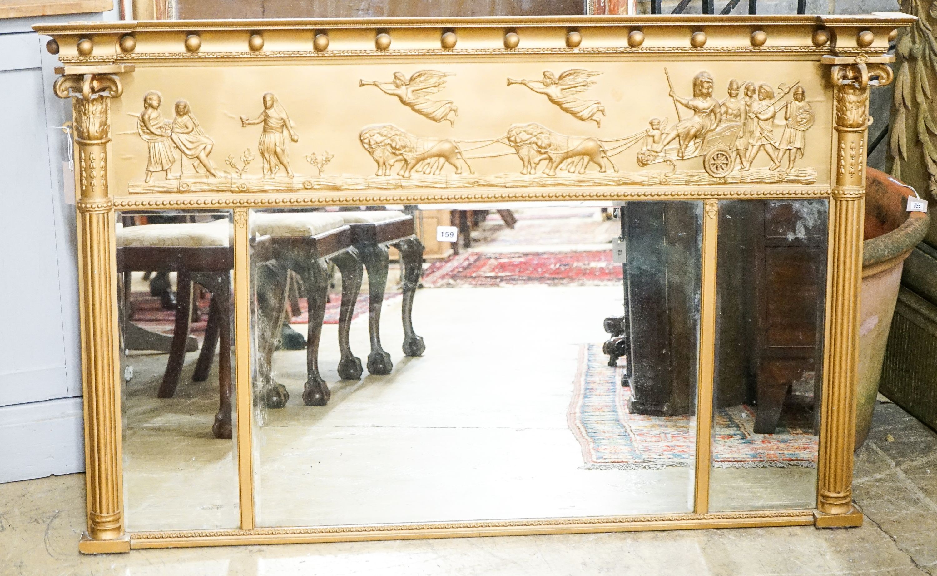 A Regency style giltwood and gesso overmantel mirror, length 140cm, height 88cm